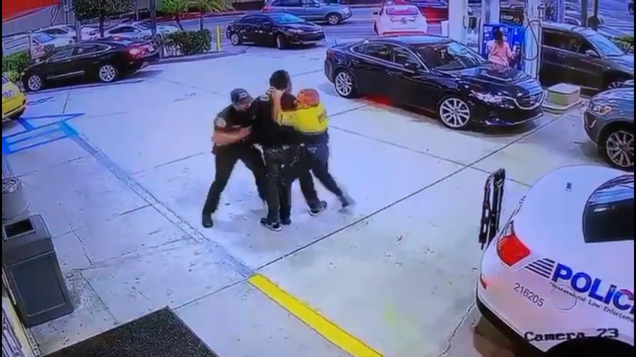 Video Shows Miami Cops Punching, Choking Unarmed Man Who Tried to Flee