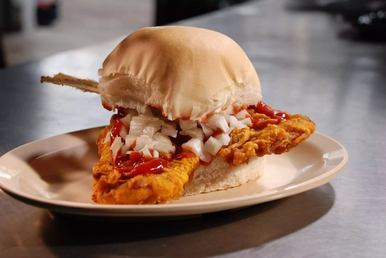 a fried fish sandwith on a cuban roll