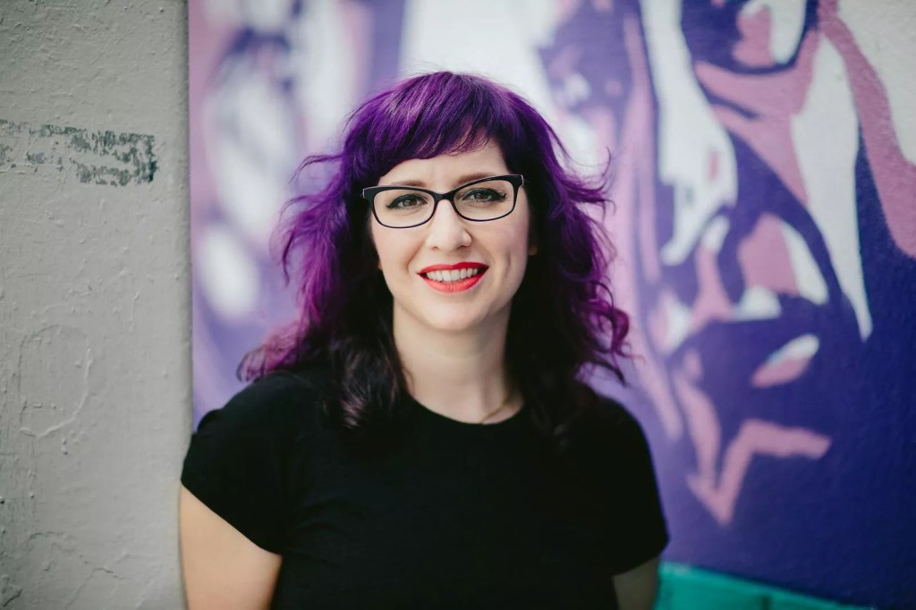 Photo of a purple haired woman