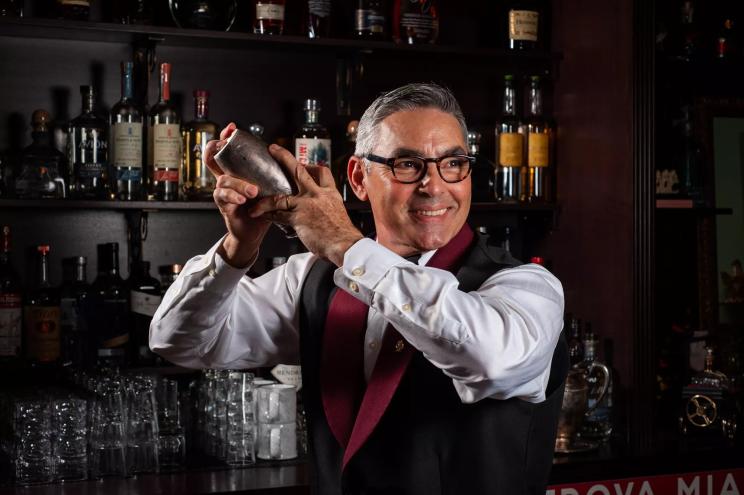 A man making a cocktail