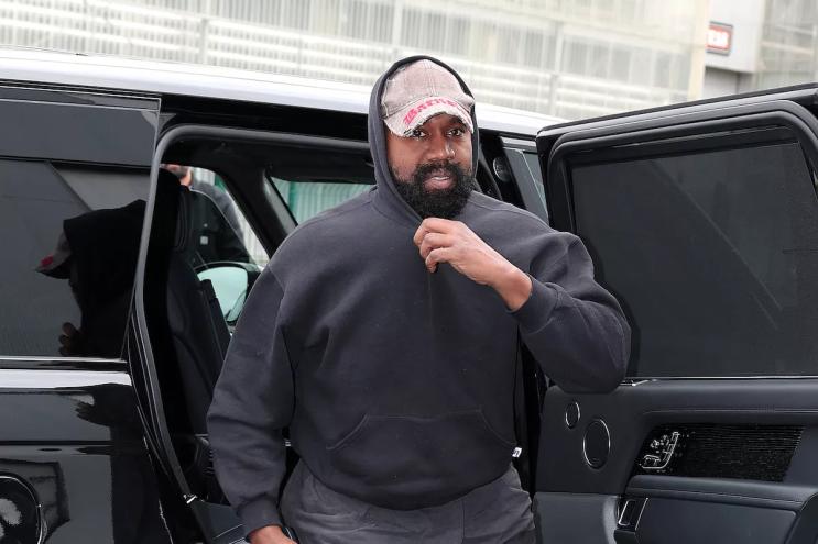 Rapper Kanye West in a black sweater