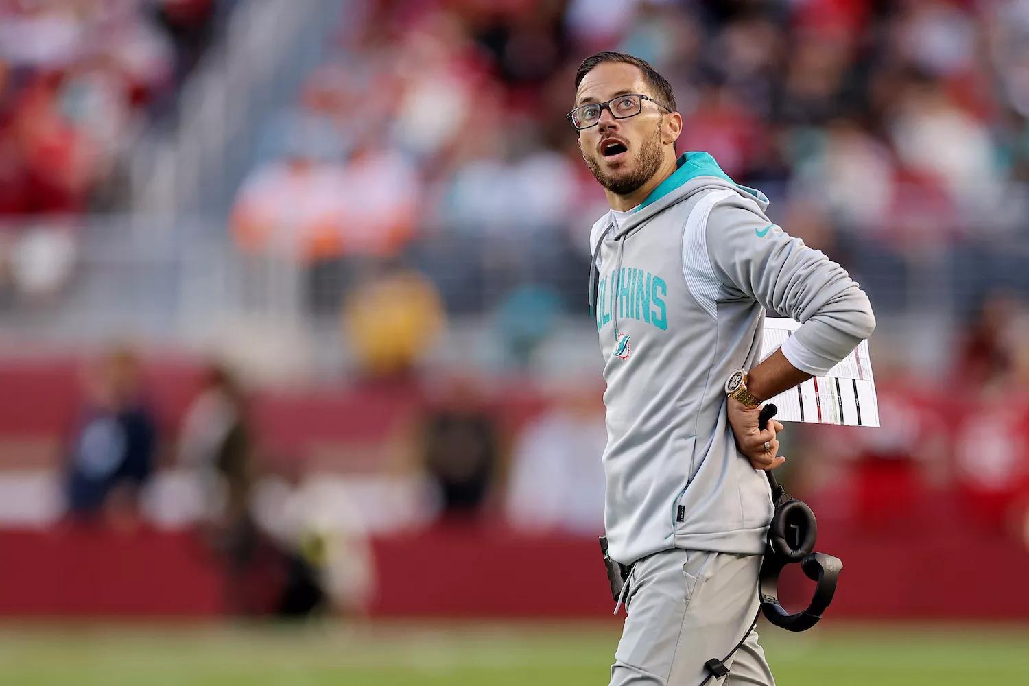 Photo of a frustrated Miami Dolphins head coach Mike McDaniel, reacting to a play during the fourth quarter of the team's 33-17 blowout loss to the San Francisco 49ers on December 4, 2022.