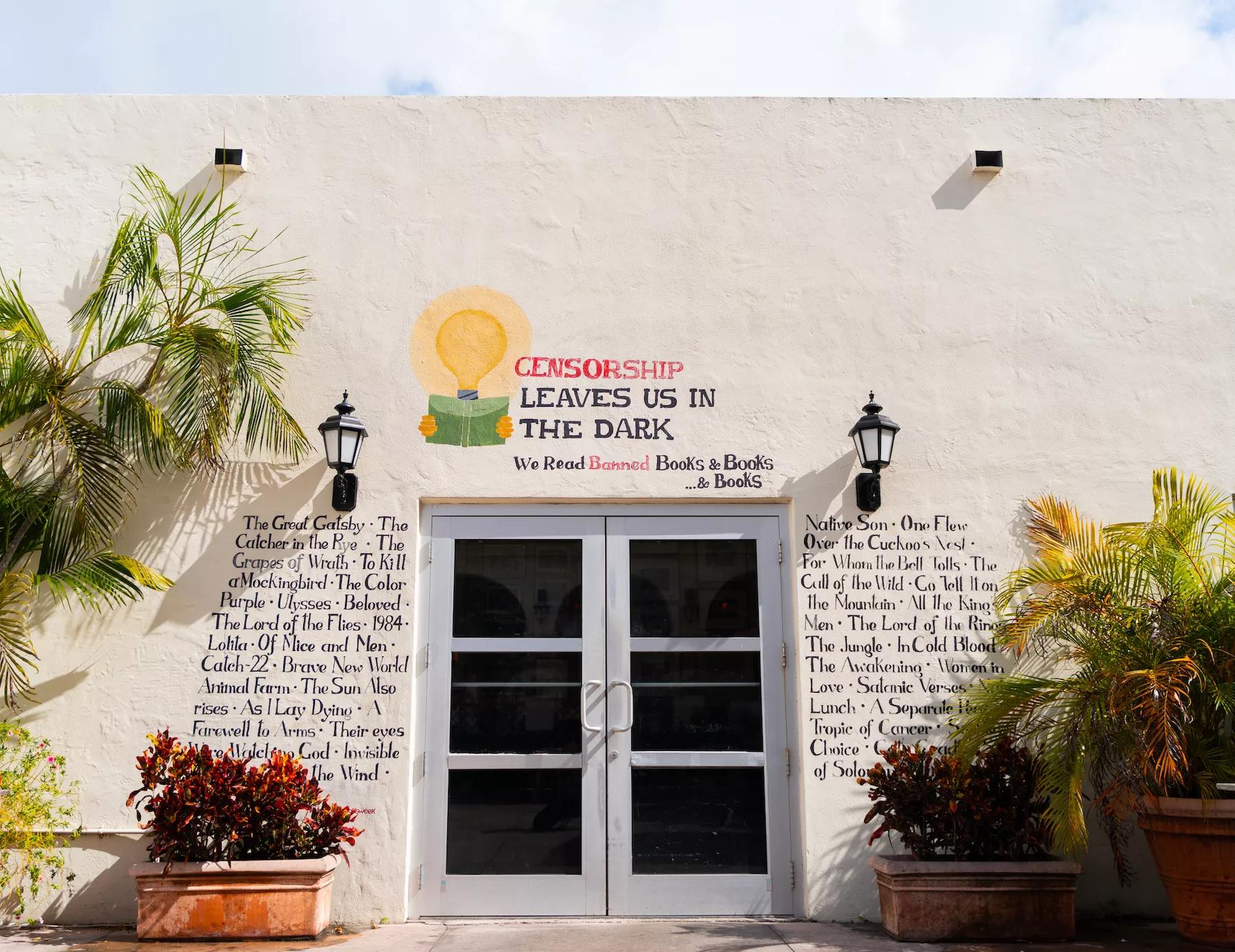 photo of a mural listing dozens of titles of famous books that have been banned