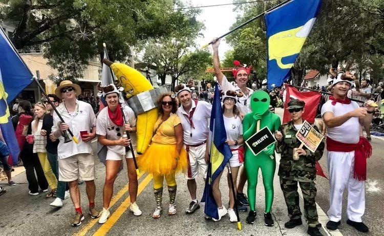 photo of participants of the King Mango Strut Parade in Coconut Grove lining the street in costume