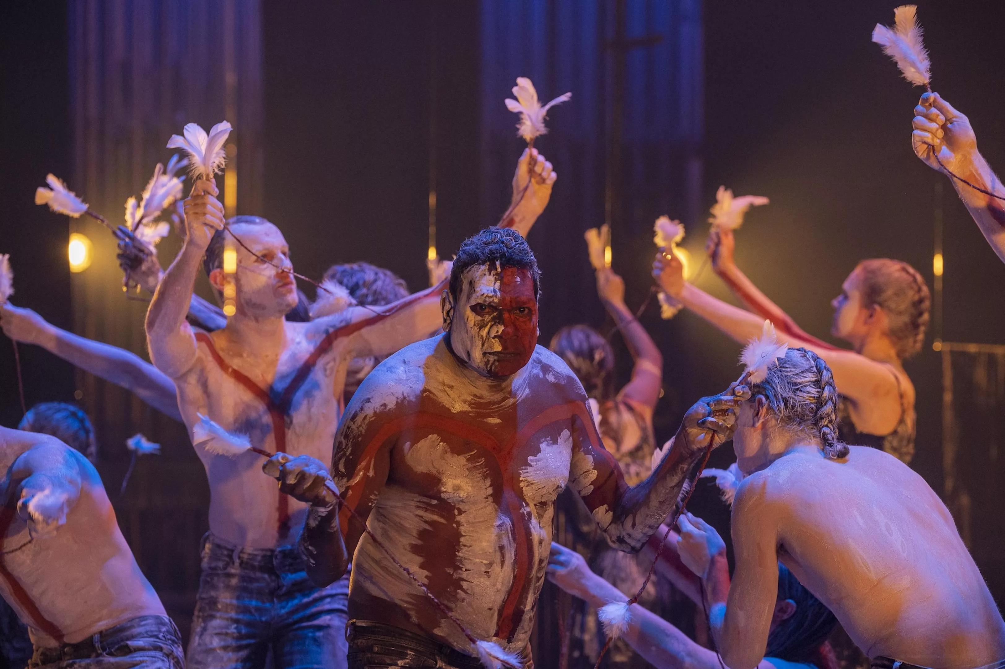 Australian aboriginal artist Banula Marika surrounded by dancers