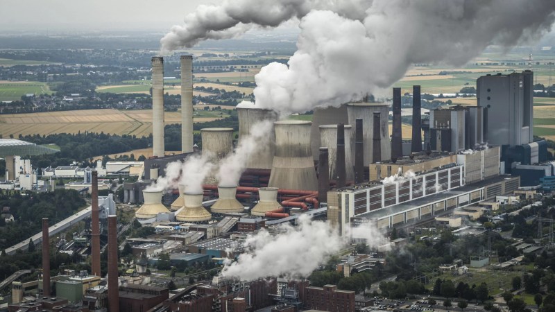 Smoke billowing from a power plant