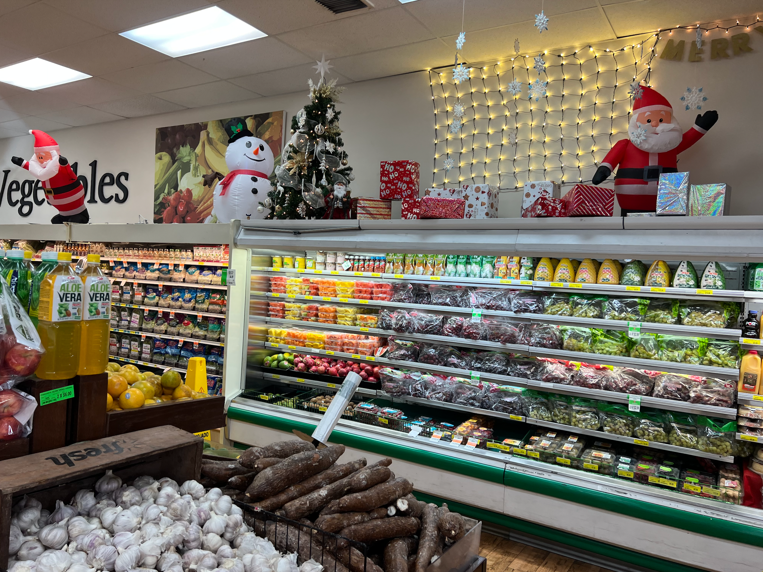 Christmas decorations in the refrigerated aisle of Sedano's