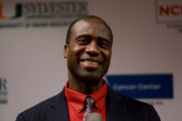 Florida's surgeon general smiles at a Miami press conference
