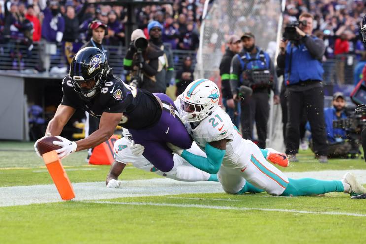 Baltimore Ravens receiver dives for a touchdown against the Miami Dolphins