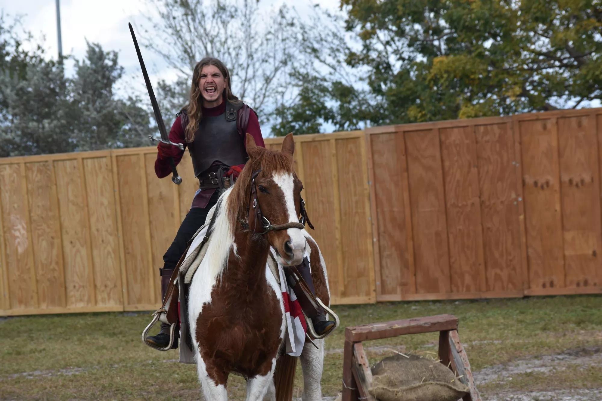 Jouster Caleb Austin Jordan riding atop a horse