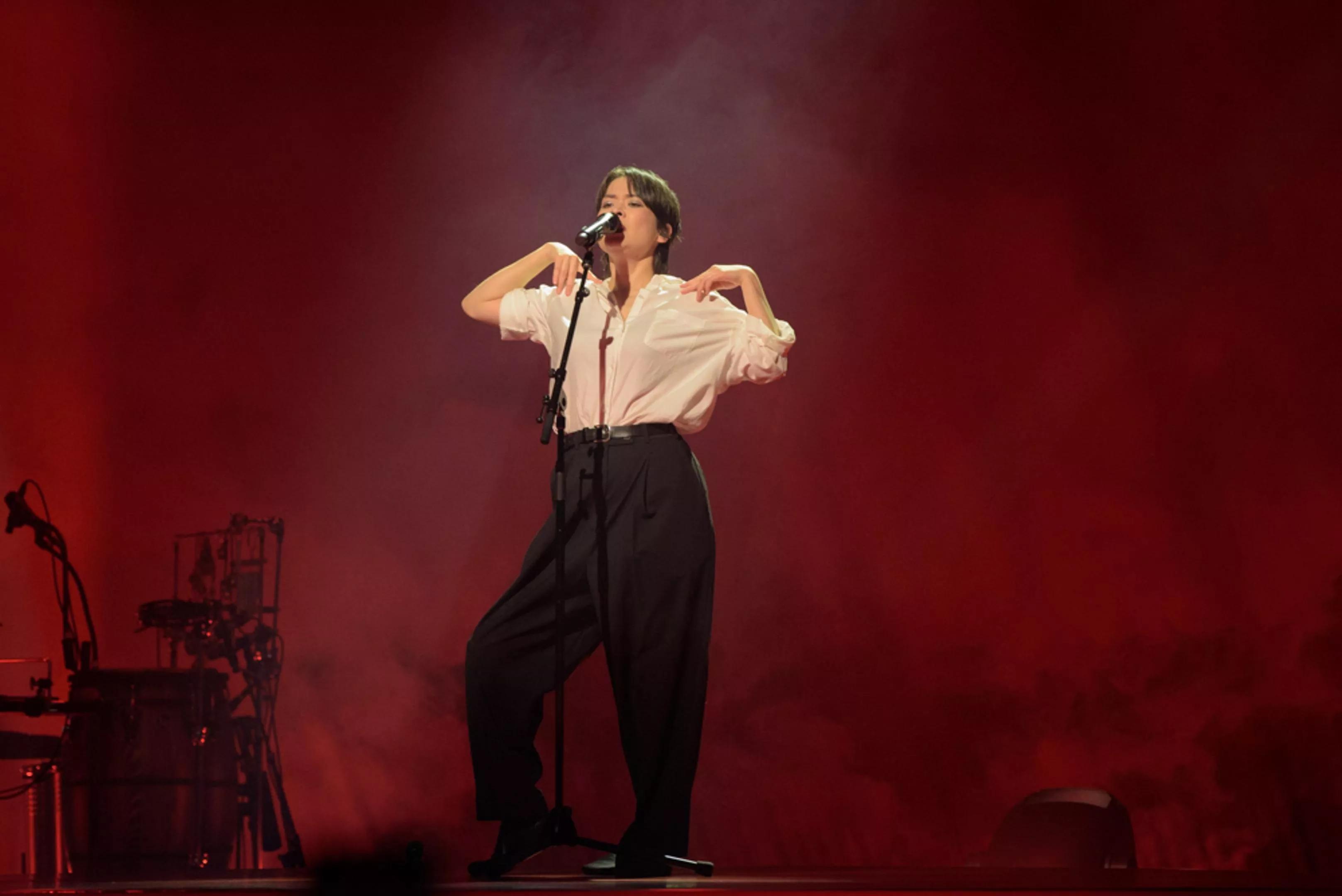 Mitski performing on stage
