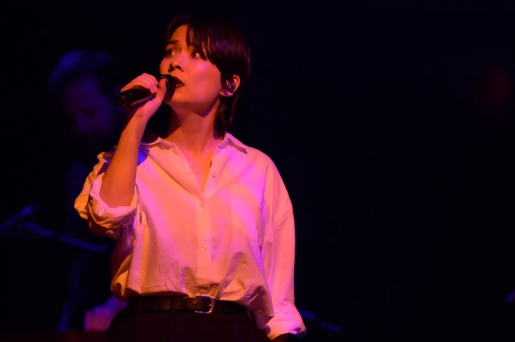 Mitski performing on stage