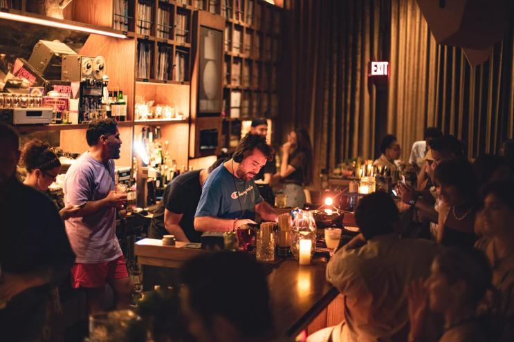 Bar with people and DJ