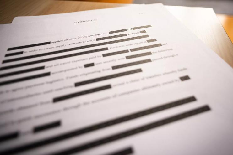 Lines blacked out on a sensitive document