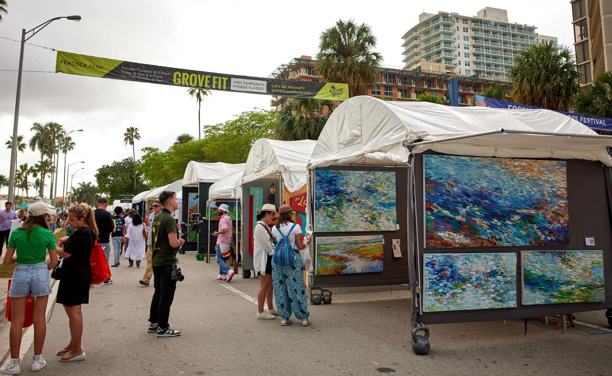 People walking the streets of Coconut Grove for the Coconut Grove Arts Festival