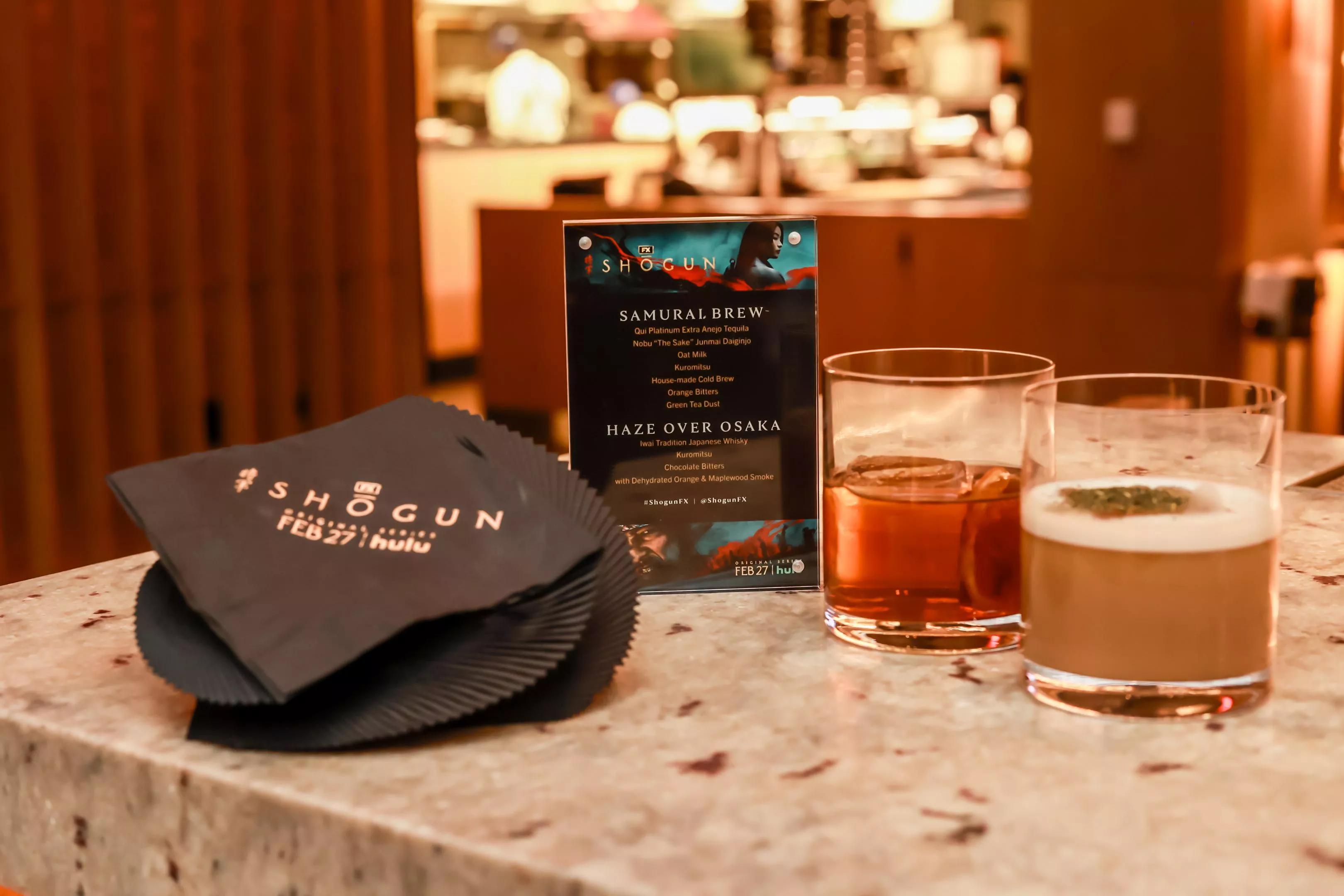 Cocktails and black napkins on a table