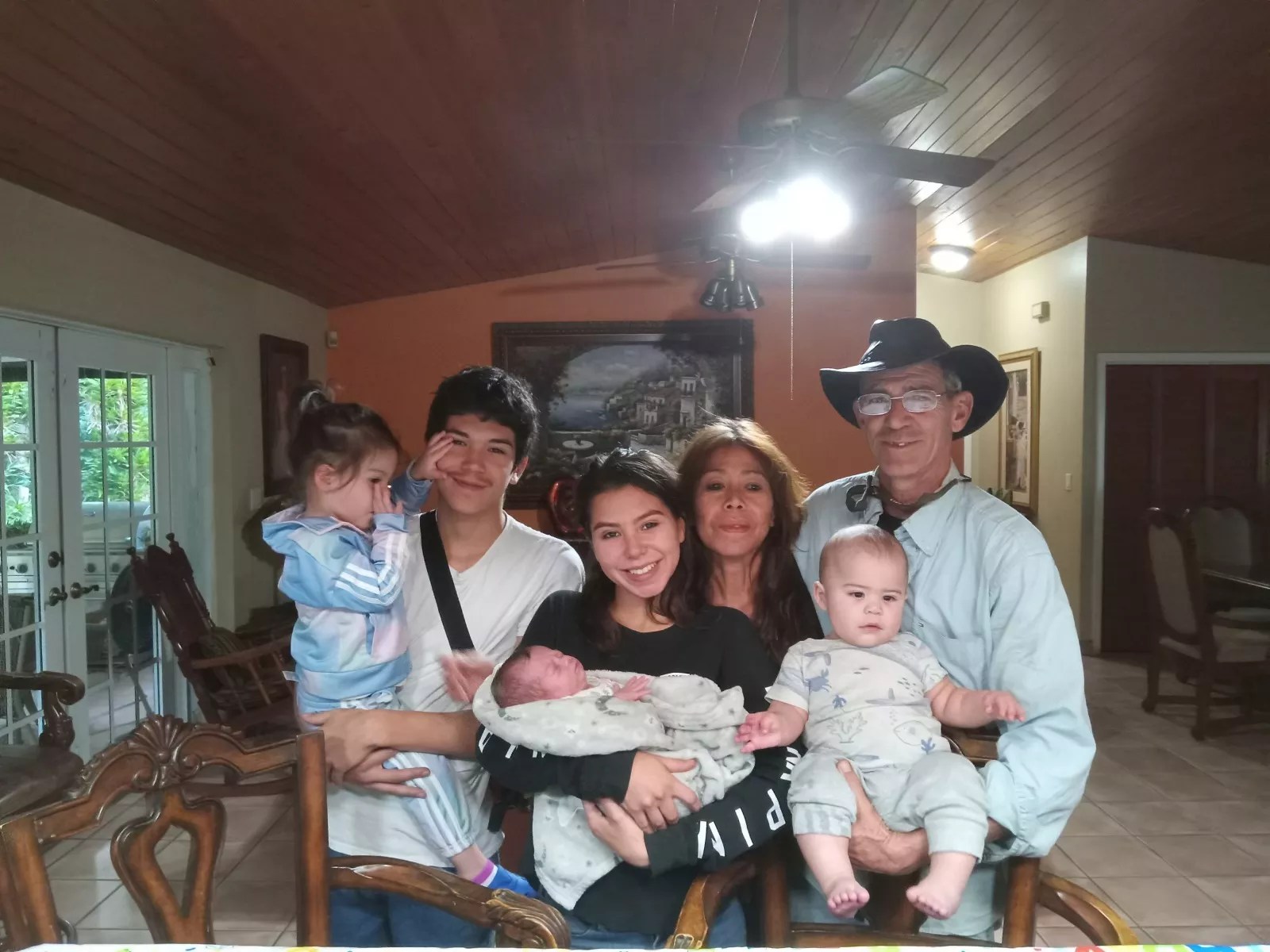 The Cueli family poses for a photo