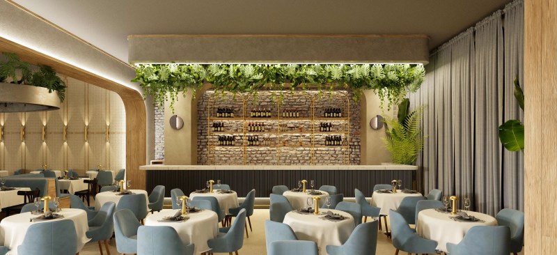 A dining room and kitchen with greenery