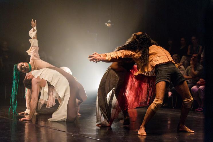 Dancers on stage performing Birds of Paradise