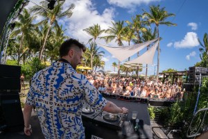 DJ spinning outdoor before a crowd