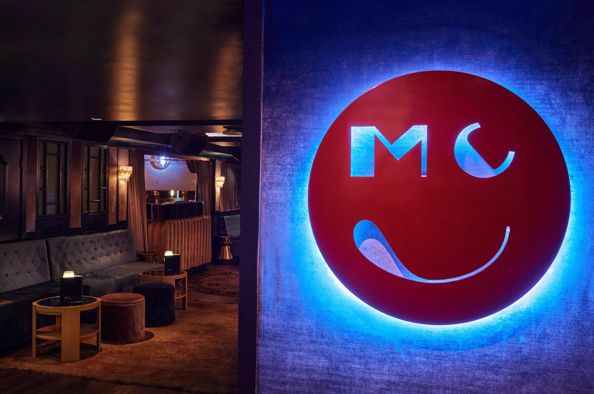 A neon sign inside a bar