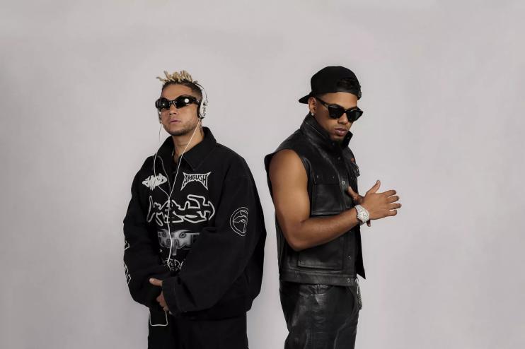 Portrait of Ovy on the Drums and Myke Towers
