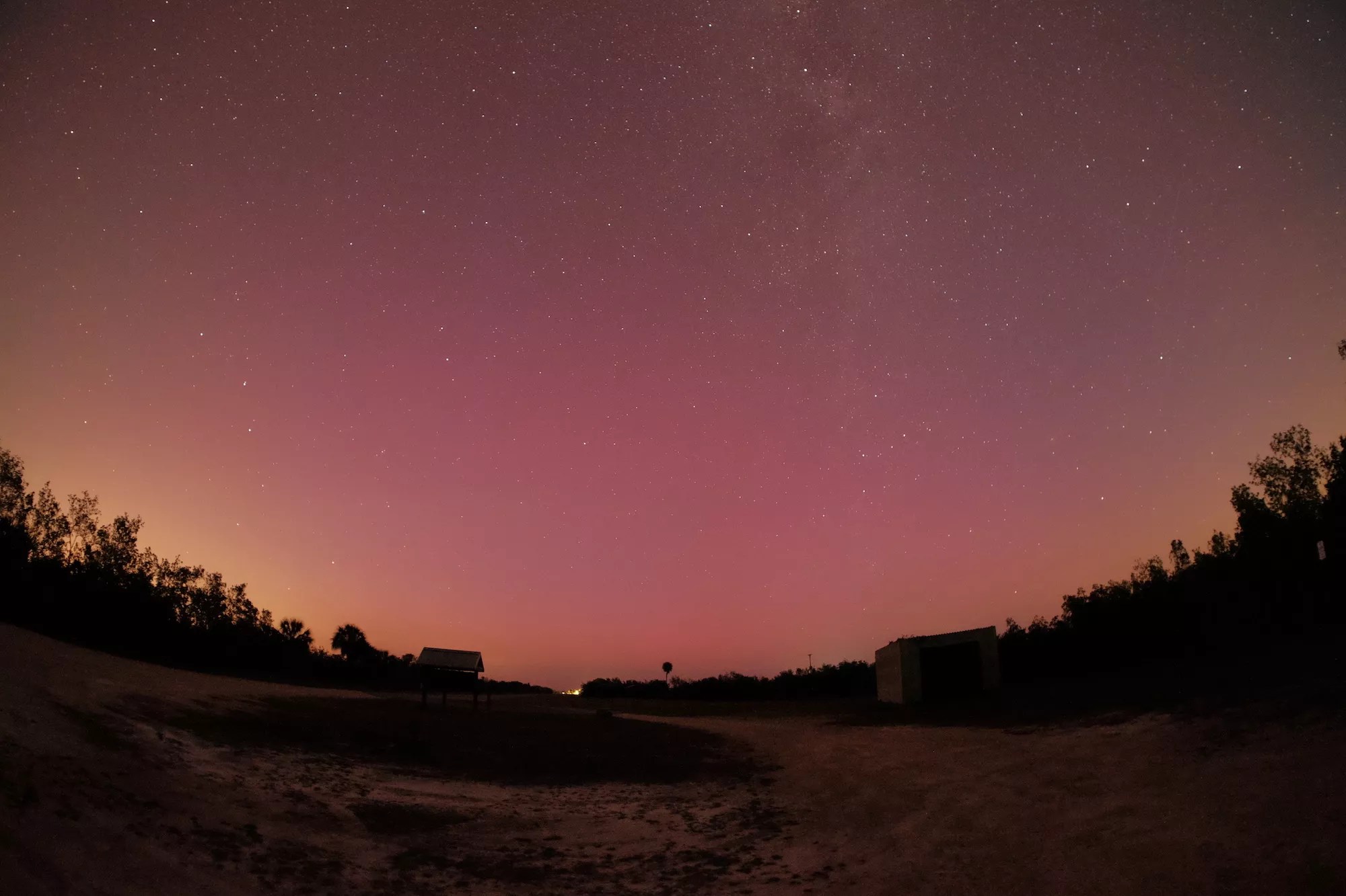 color panorama of the aurora borealis, photographed during the geomagnetic solar flare event of May 10-12, 2024