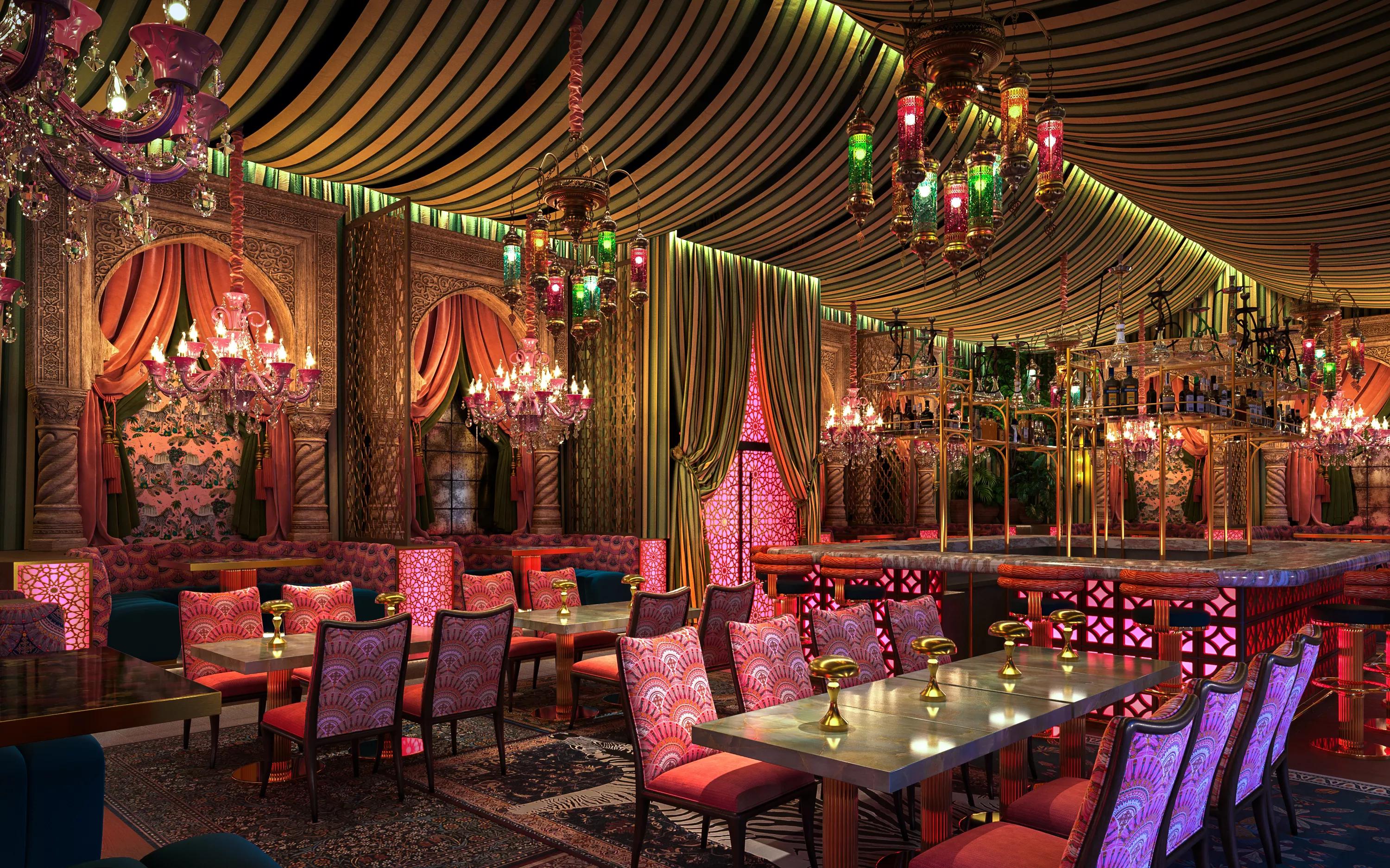 A dimly lit and colorful dining room with pink lighting