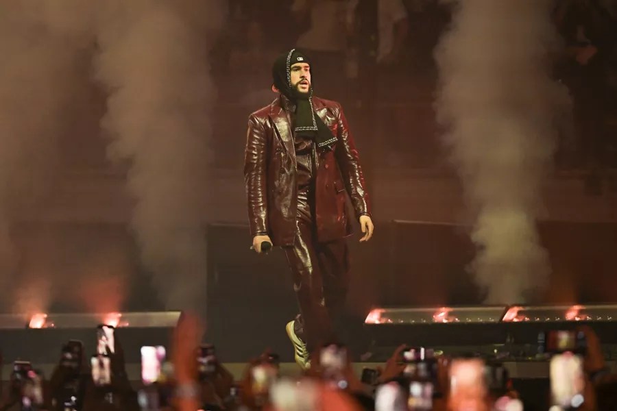Bad Bunny performing on stage at the Kaseya Center