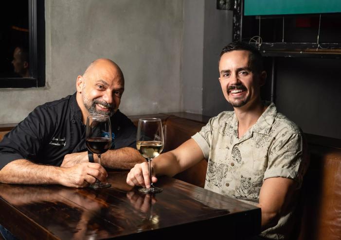 Two men posing for a photo