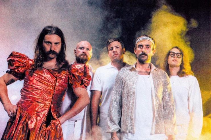 Portrait of the five members of Idles
