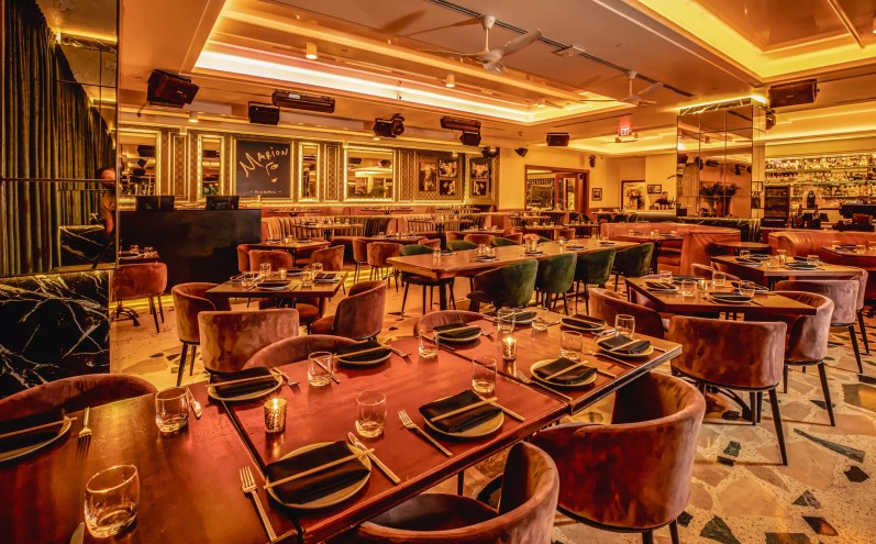 A glamorous dining room with plus seating.