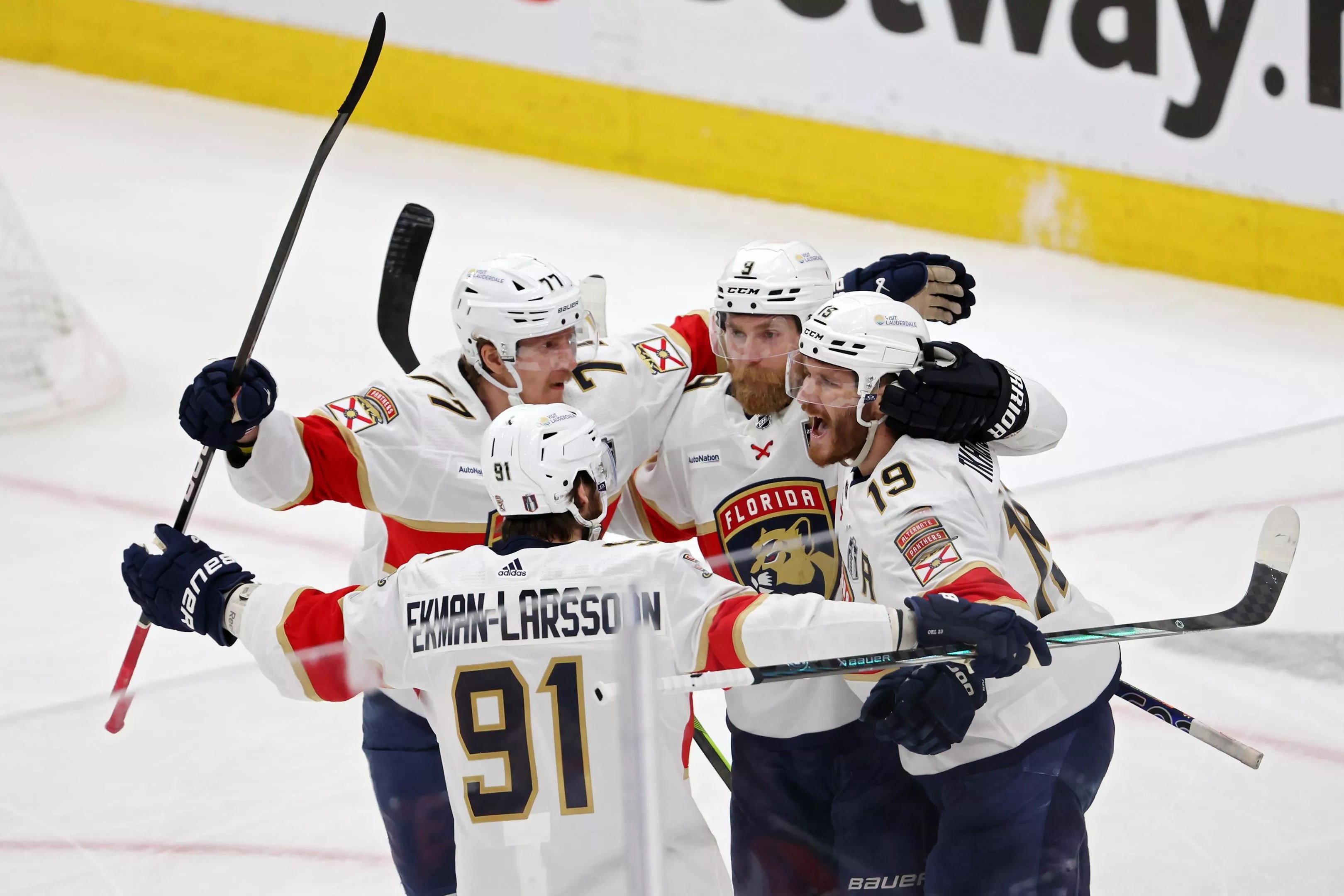 Florida Panthers teammates huddle up in celebration after Sam Bennett scores a goal in Game 3 of the 2024 Stanley Cup