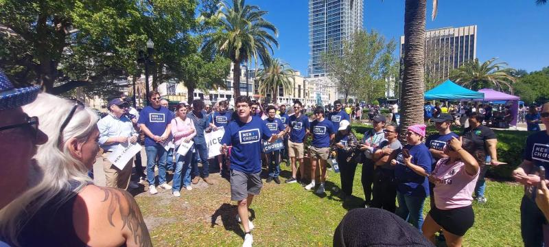 Aaron Bos-Lun speaks at rally