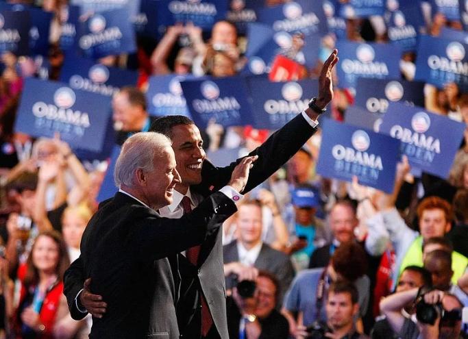Joe Biden and Barack Obama wave to DNC attendees in August of 2008.
