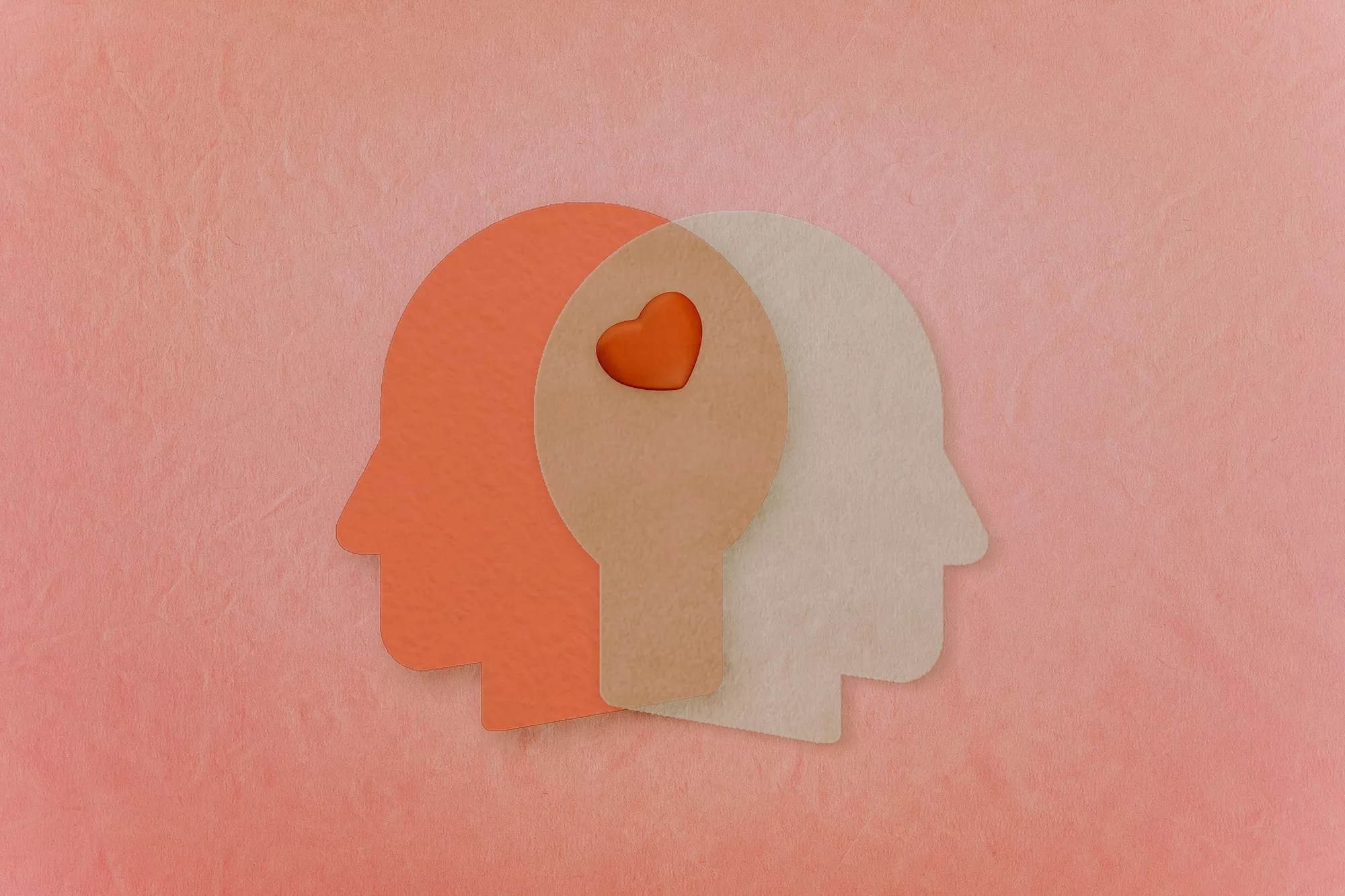 An illustration of two heads sharing a heart