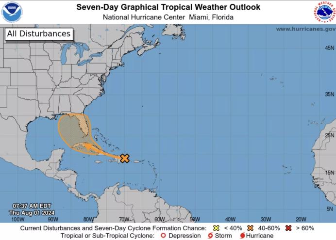 A graphic showing a tropical disturbance in the Caribbean with Florida in its projected path