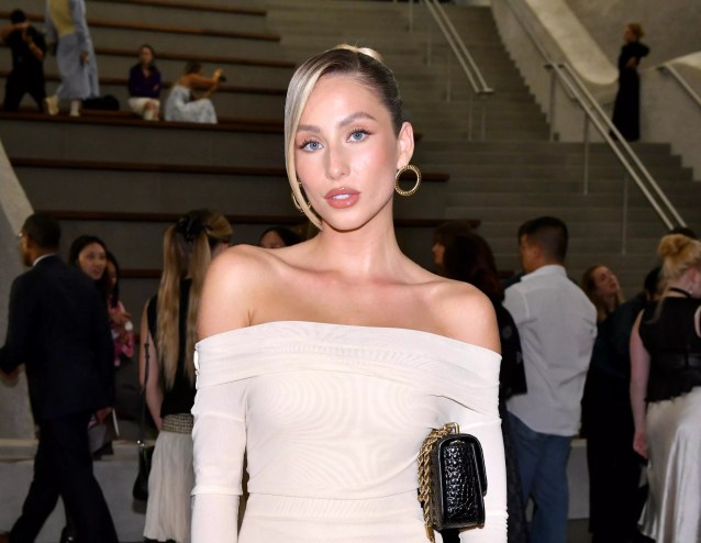 Alix Earle in a long white, shoulderless dress