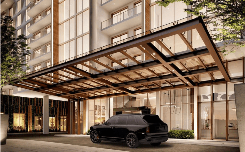 A luxury vehicle in front of a high-end condo building in Miami-Dade's North Bay Village