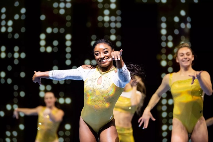 Simone Biles dancing during a performance of the Gold Over America Tour