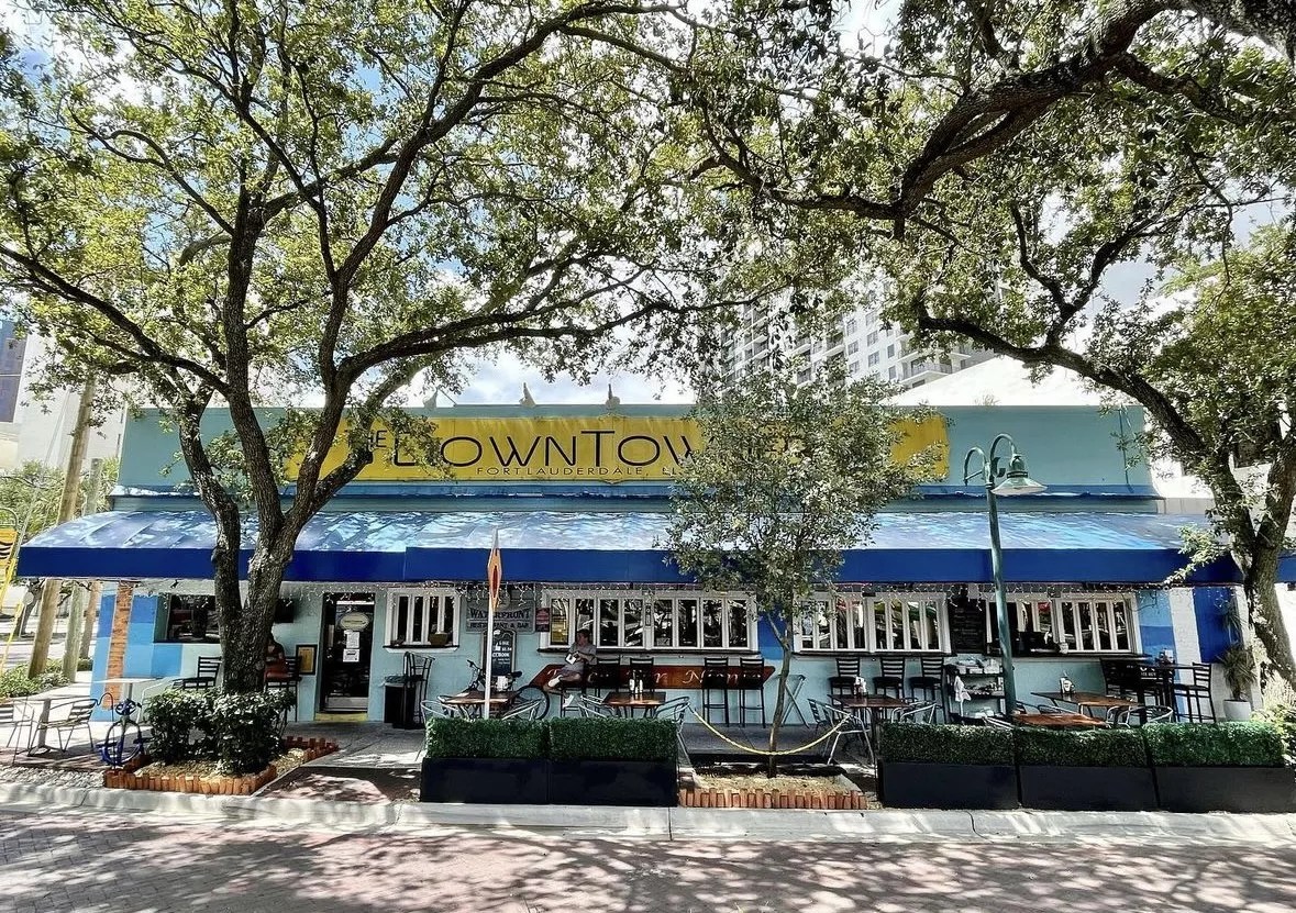 A restaurant with trees outside