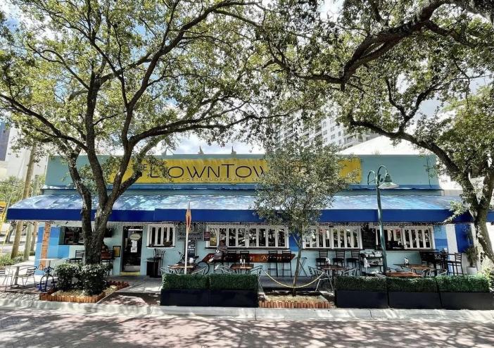 A restaurant with trees outside