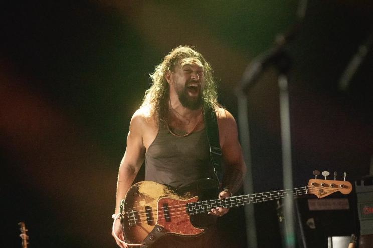 Jason Momoa on stage with