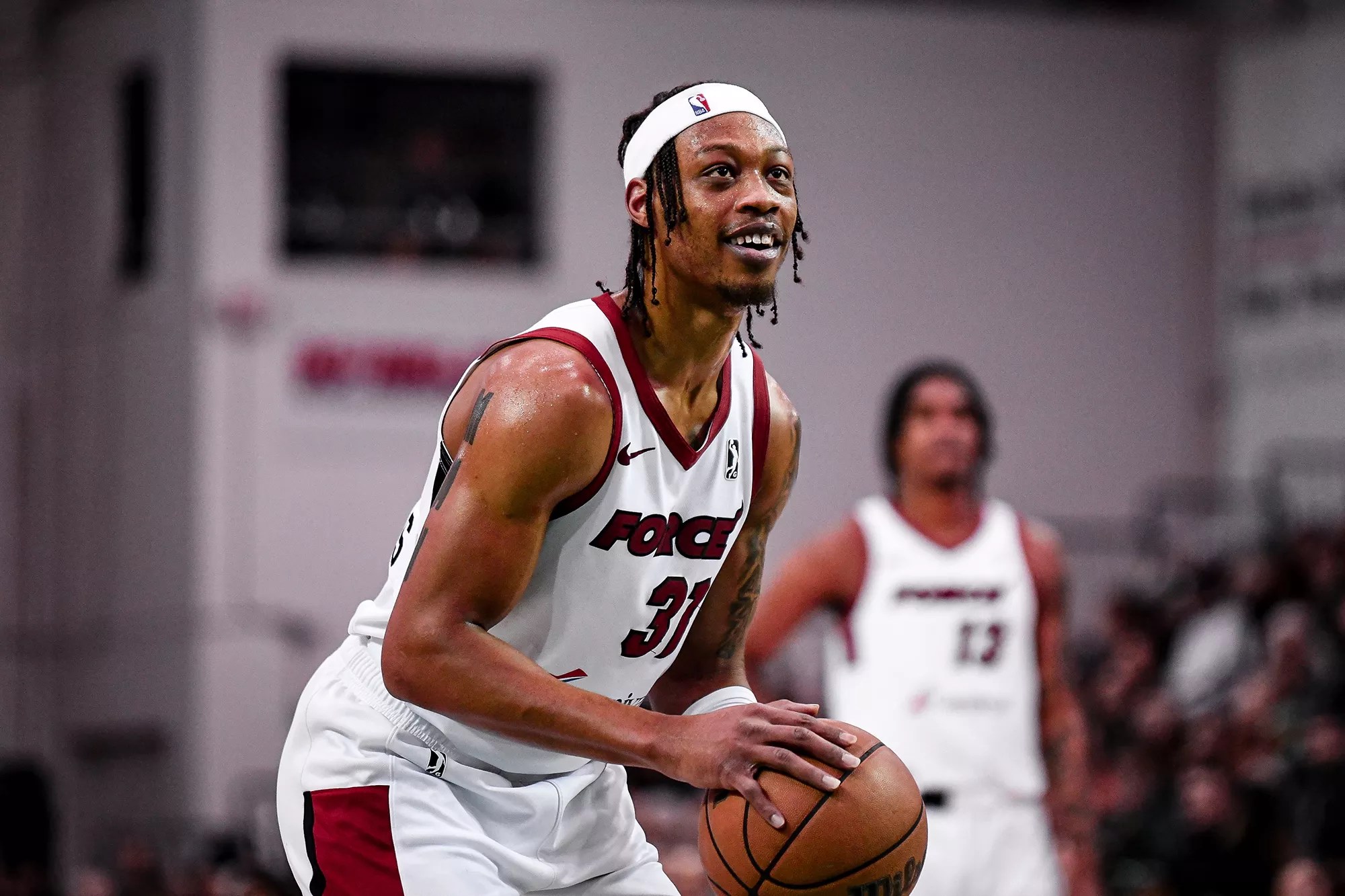 photo of a basketball player preparing to shoot