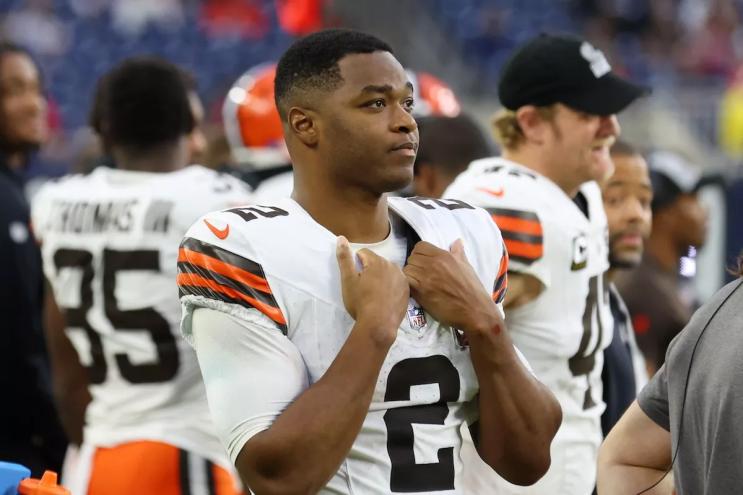 Amari Cooper wearing a white Cleveland Browns Jersey
