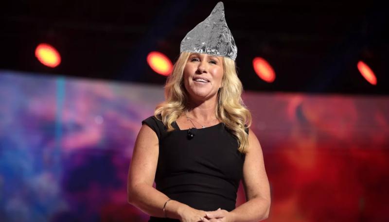 photo of Marjorie Taylor Greene with a tinfoil hat photoshopped atop her noggin
