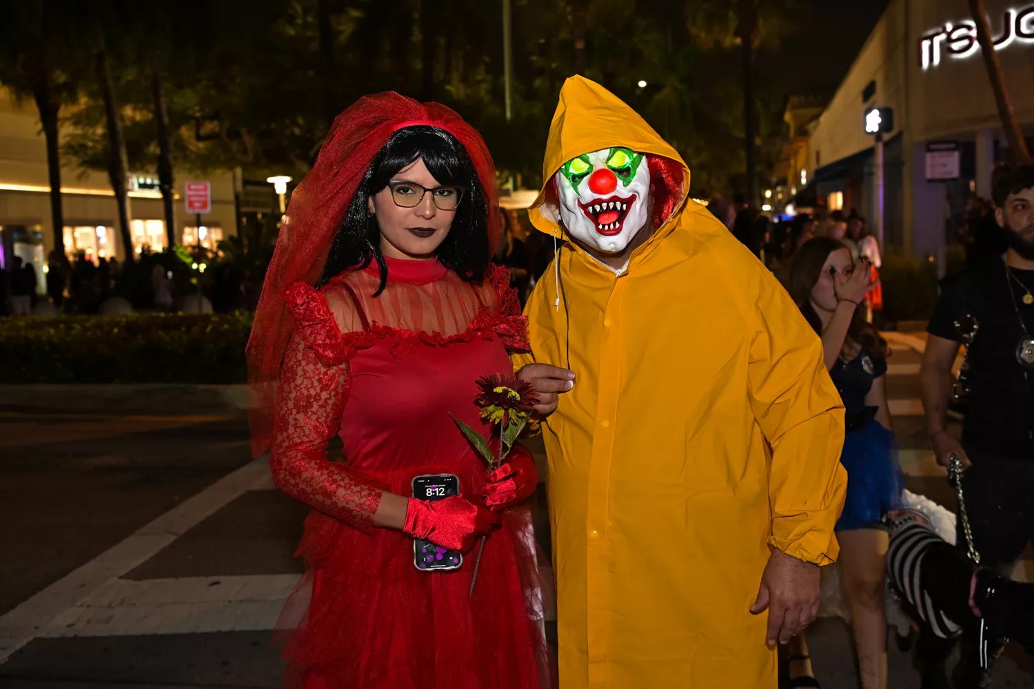 People in costume on Halloween night on Lincoln Road in Miami Beach