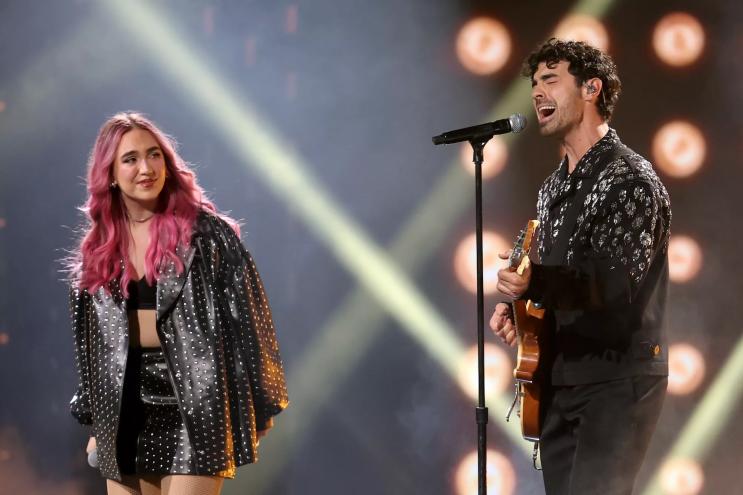 Joe Jonas and Ela Taubert onstage at the Latin Grammys in Miami