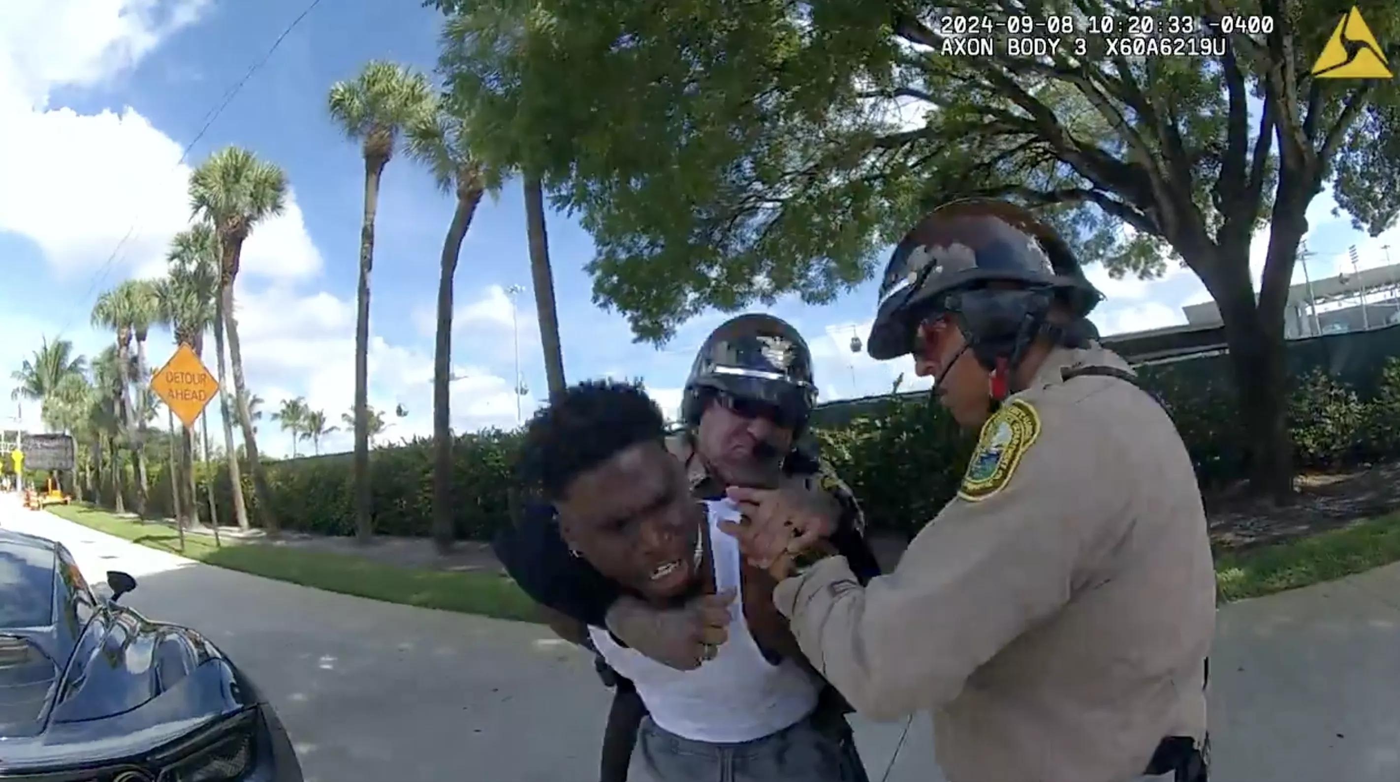 police arresting a man