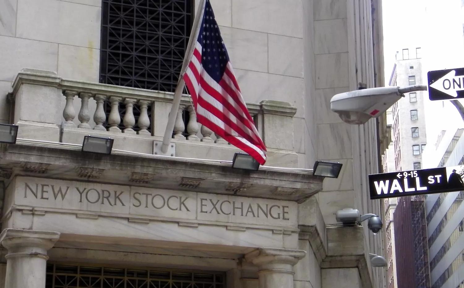 photo of an entrance to the New York Stock Exchange headquarters on Wall Street